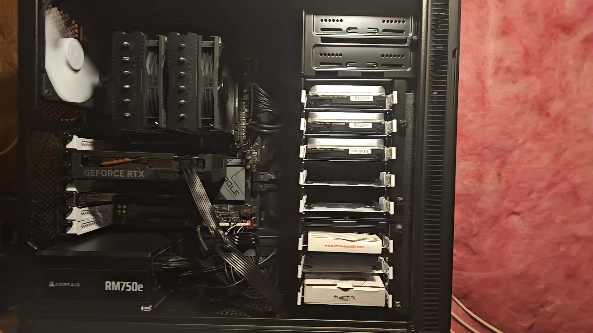 Unraid server interior showing drive bays filled