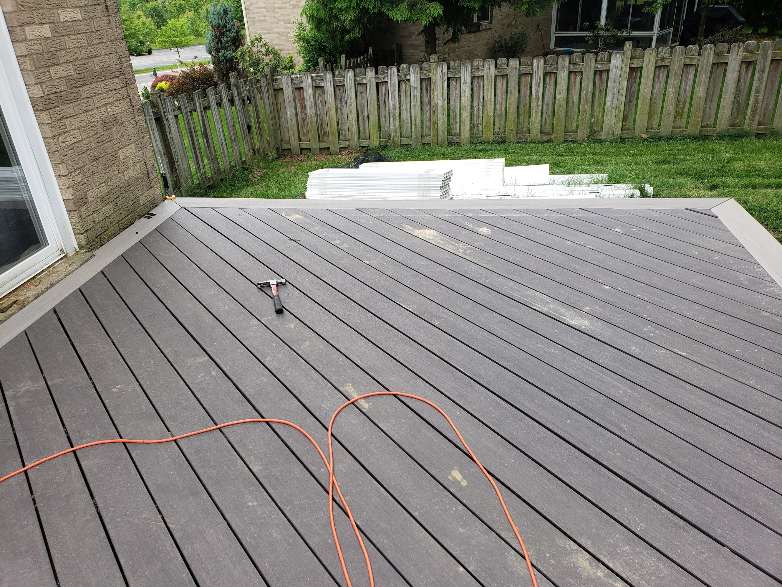 Border complete, fence panels staged