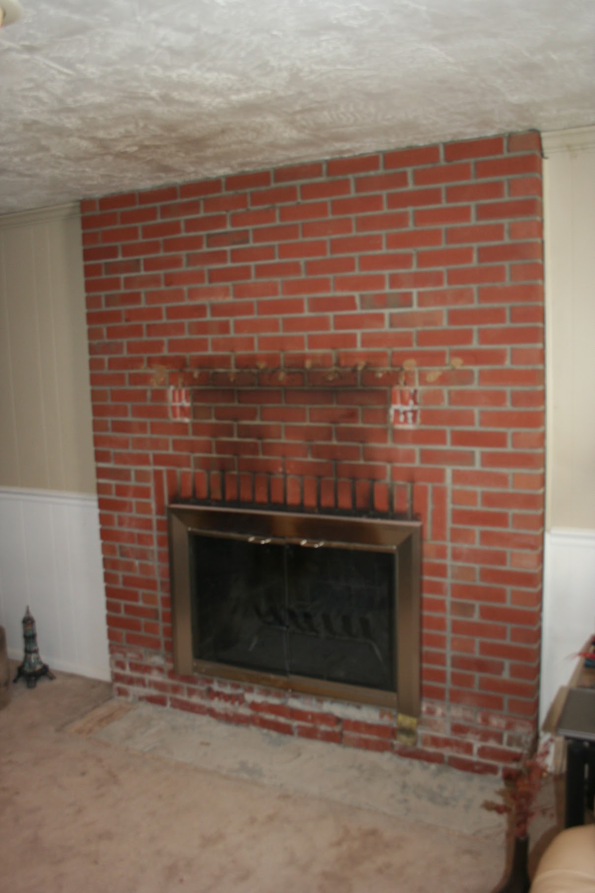 Steel framing over brick with TV mount