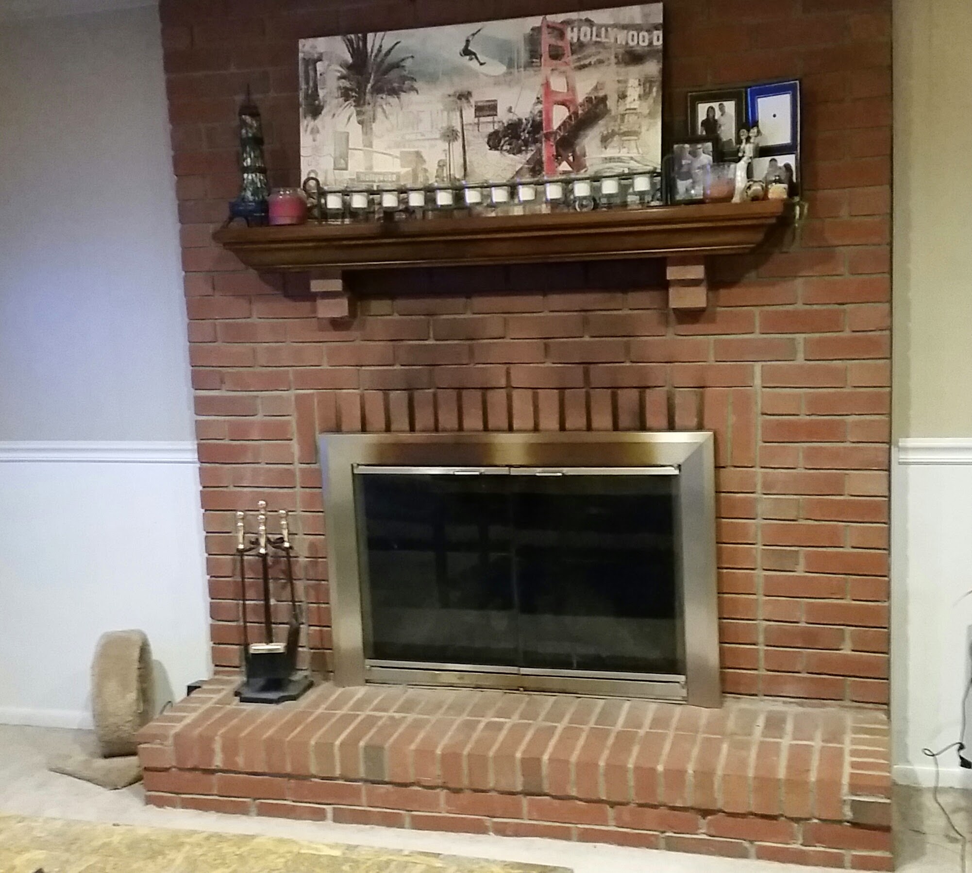 Original brick fireplace with mantle