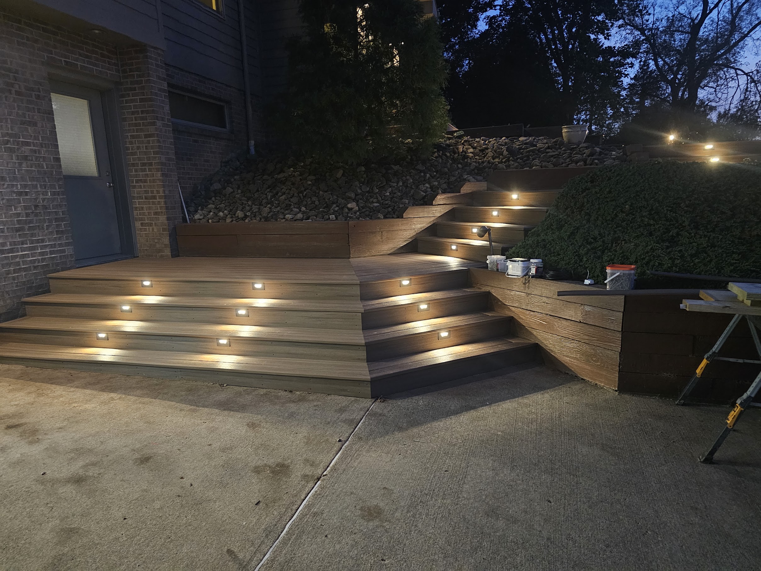 Deck with step lights glowing at night