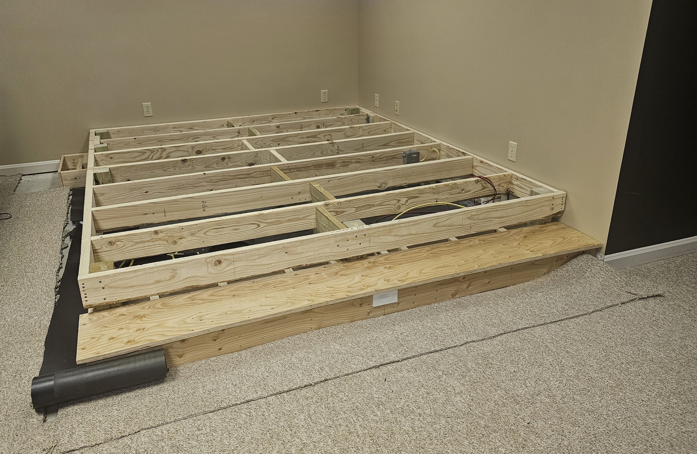 Step riser plywood with wiring in cavity